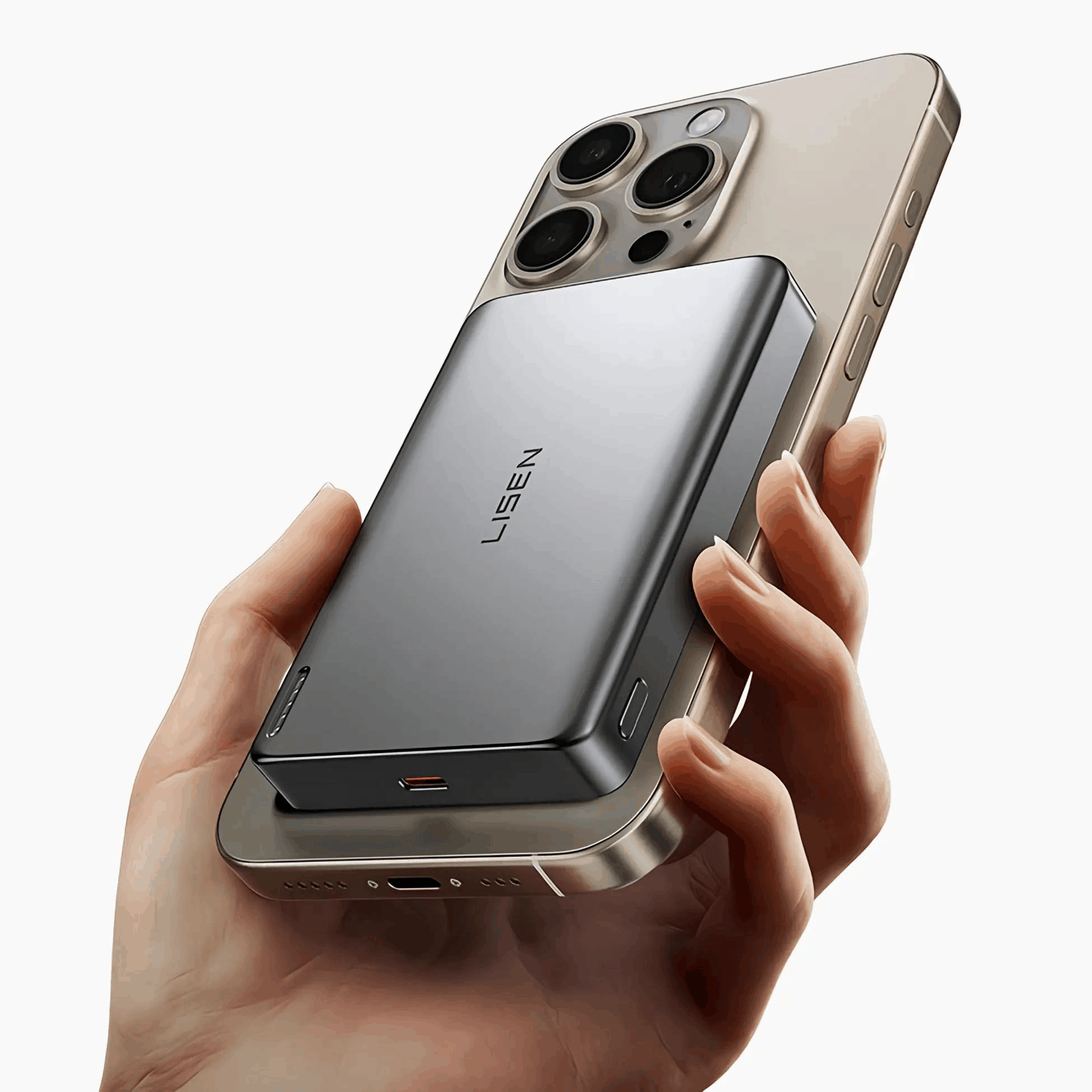 Lisen Snap Pro MagSafe battery bank attached to gold iPhone for wireless charging
